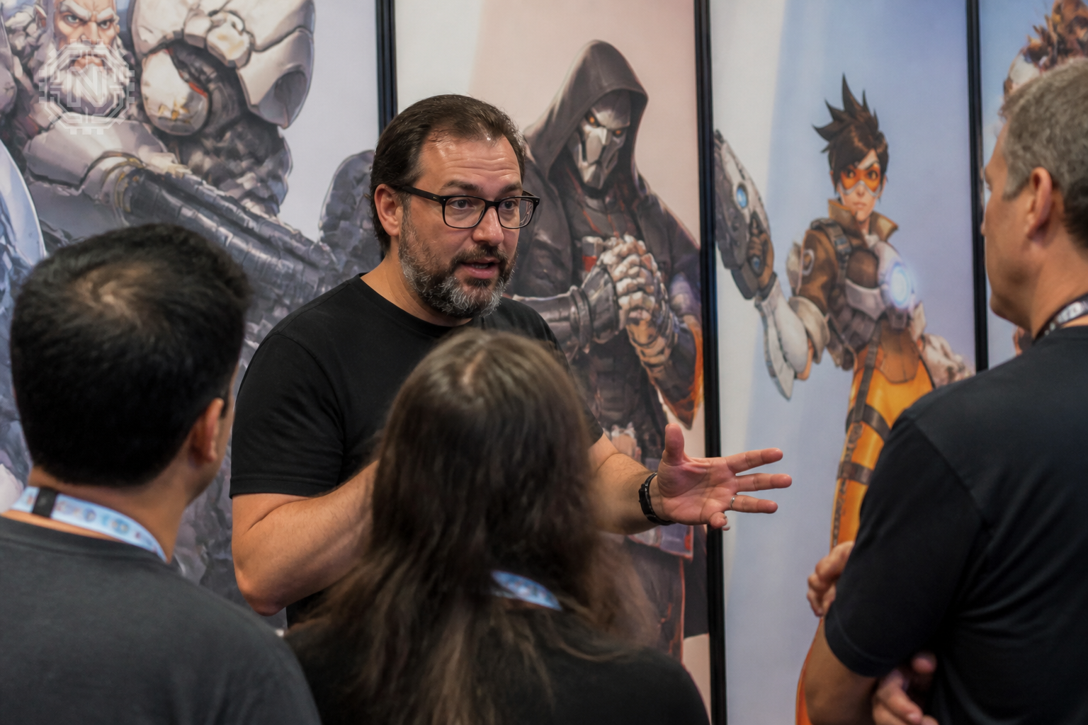 Developer explaining Overwatch 2 PvE mode at a gaming event