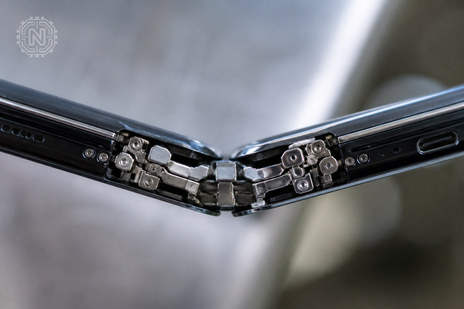 Foldable smartphone hinge close-up with durability features