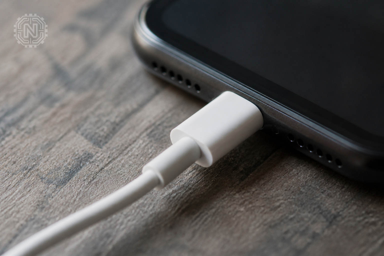 Smartphone charging with cable and fast charger in use