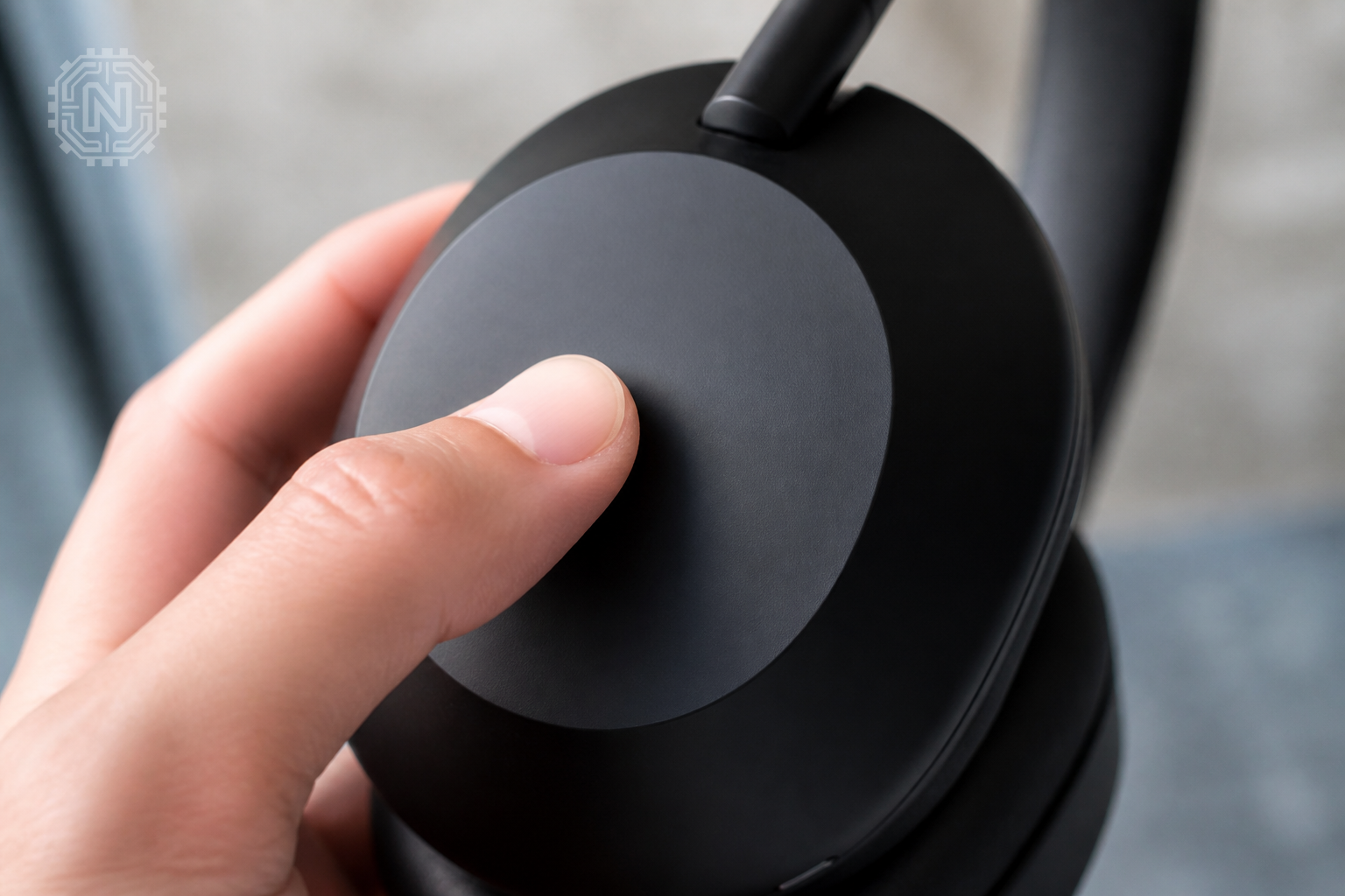 Close-up of Sony WH-1000XM5 touch-sensitive controls
